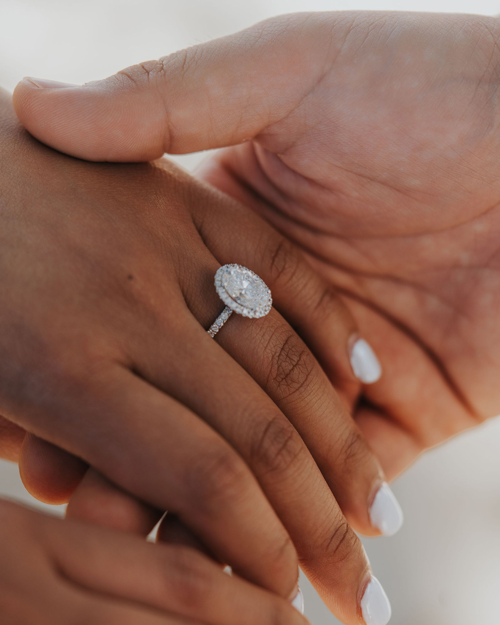 Macro detail of the engagement ring on Brigette's hand