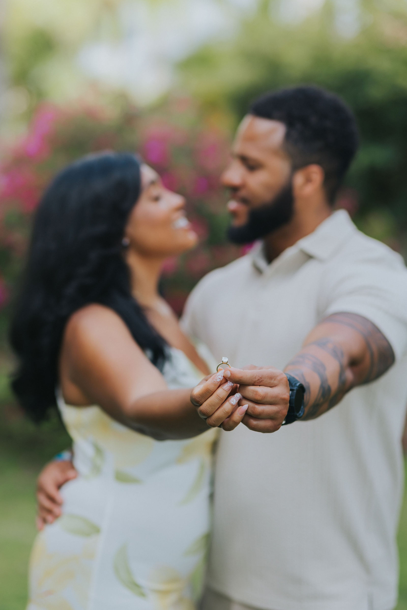 Ama and Israel laughing together after the proposal